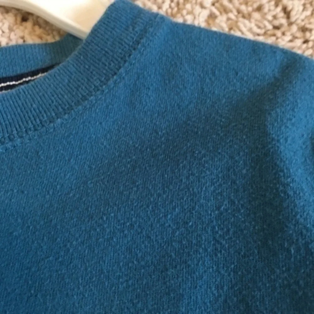 Boys size medium blueish green long sleeve shirt
